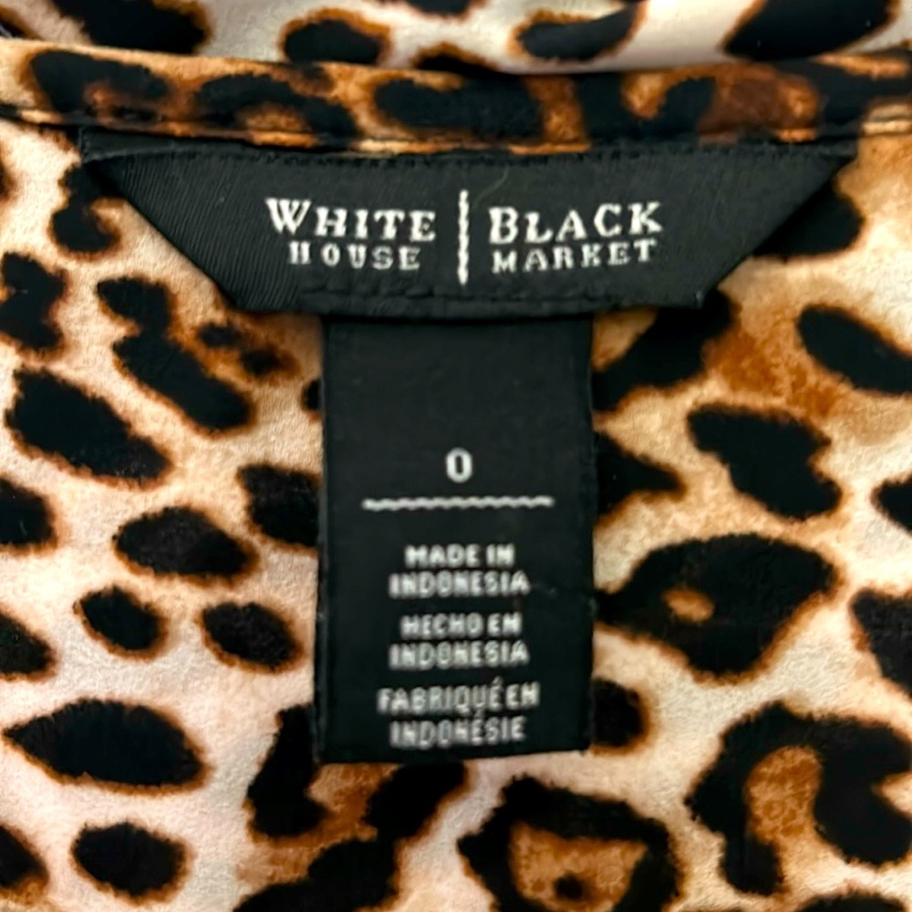 White House Black market leopard print top. Size 0